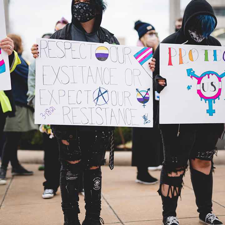 Demonstrators protesting anti-trans bills.